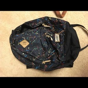 Paint splattered backpack